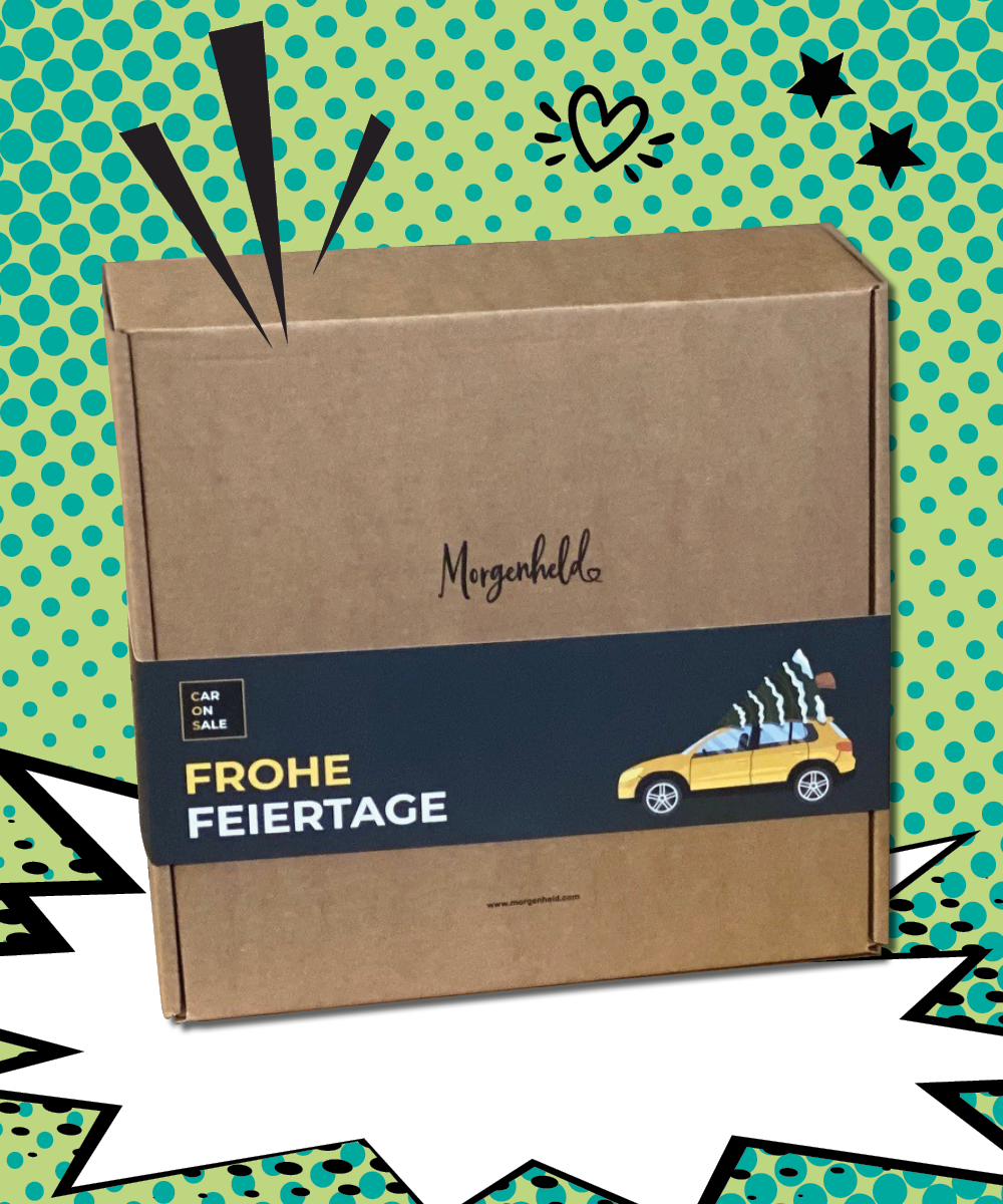 gebrandete Morgenheld-Probierbox mit individueller Banderole für Frohe Feiertage von CaronSale