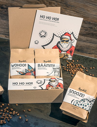 Weihnachtliches Kaffeegeschenkset „HO HO HO!!“ mit vier aromatischen Espresso‑Röstungen von Morgenheld.